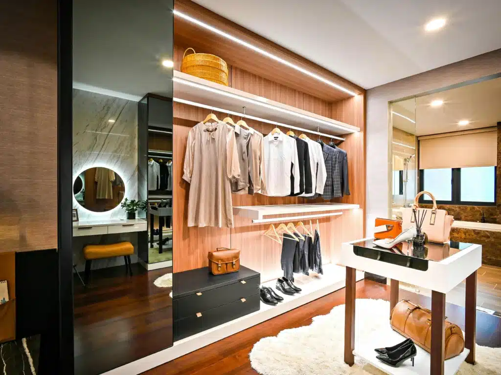 inside view of fitted wardrobe filled with formal and informal clothing